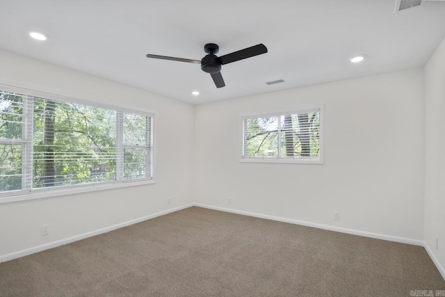 9425 Hogue Rd, Mabelvale, AR 72103 - unfurnished room with carpet, a ceiling fan, baseboards, and recessed lighting
