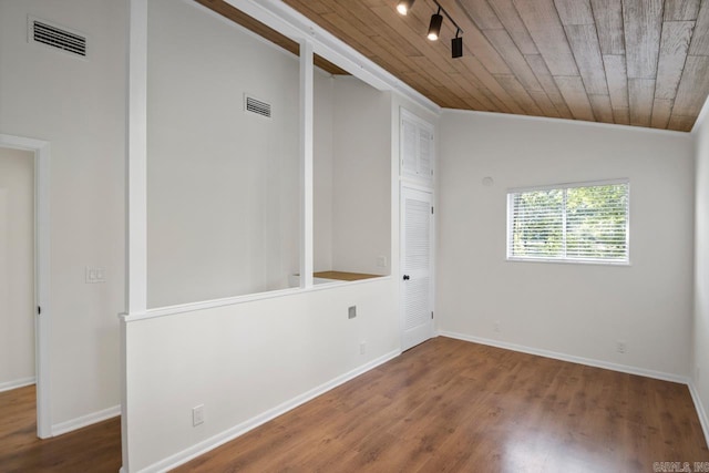 9425 Hogue Rd, Mabelvale, AR 72103 - empty room with wood finished floors, wood ceiling, baseboards, and vaulted ceiling