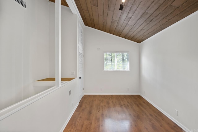 9425 Hogue Rd, Mabelvale, AR 72103 - spare room with wooden ceiling, wood finished floors, lofted ceiling, baseboards, and crown molding
