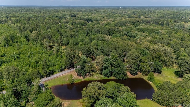 9425 Hogue Rd, Mabelvale, AR 72103 - aerial view of property and surrounding area with a nearby body of water and a heavily wooded area