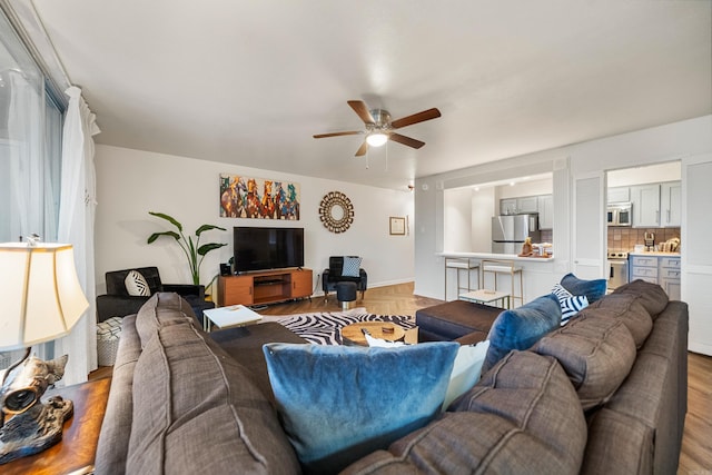 740 Weston Rd Unit 512-C, Hot Springs, AR 71913 - living room with ceiling fan and parquet flooring