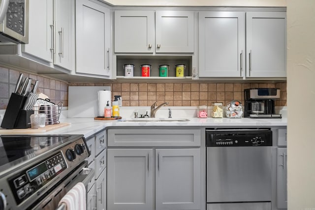 740 Weston Rd Unit 512-C, Hot Springs, AR 71913 - kitchen featuring appliances with stainless steel finishes, a sink, backsplash, and open shelves