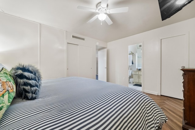 740 Weston Rd Unit 512-C, Hot Springs, AR 71913 - bedroom featuring connected bathroom and a ceiling fan