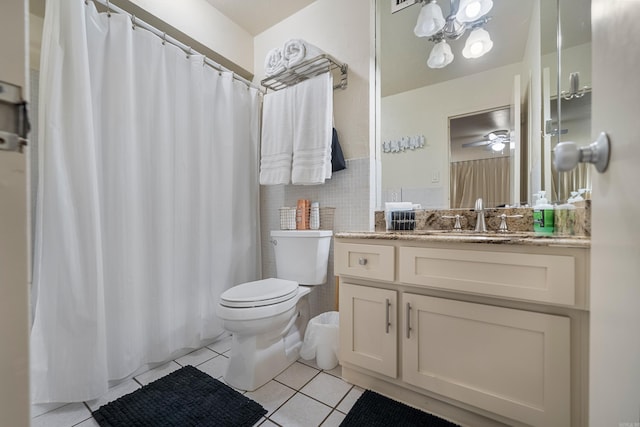 740 Weston Rd Unit 512-C, Hot Springs, AR 71913 - bathroom with tile patterned floors, toilet, vanity, a shower with shower curtain, and tile walls