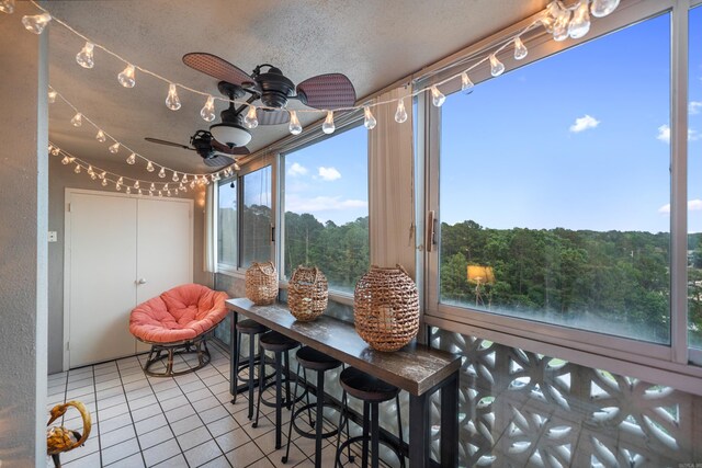 740 Weston Rd Unit 512-C, Hot Springs, AR 71913 - sunroom / solarium featuring tile patterned floors and a textured ceiling