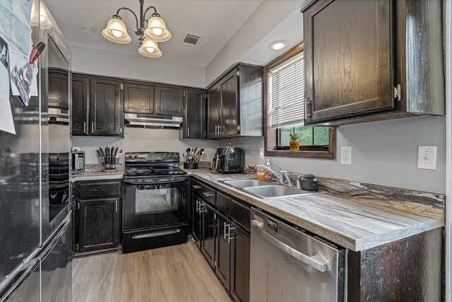 1301 Golf Crse, Jonesboro, AR 72404 - kitchen with black range with electric cooktop, stainless steel dishwasher, a sink, under cabinet range hood, and a chandelier