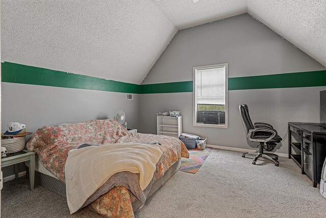 1301 Golf Crse, Jonesboro, AR 72404 - carpeted bedroom with lofted ceiling, a textured ceiling, and baseboards