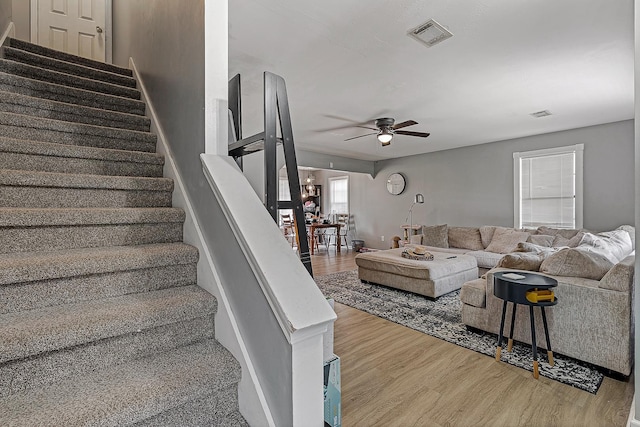 1301 Golf Crse, Jonesboro, AR 72404 - stairs featuring ceiling fan and wood finished floors