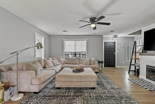 1301 Golf Crse, Jonesboro, AR 72404 - living room with a ceiling fan, wood finished floors, and baseboards