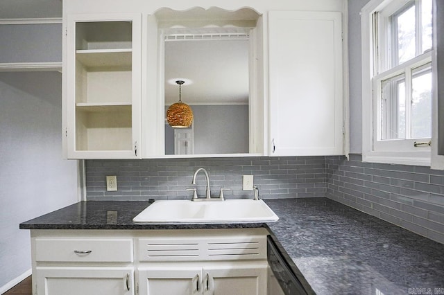 804 N Clarkson Ave, Little Rock, AR 72205 - kitchen with a sink, white cabinetry, decorative backsplash, dishwasher, and dark stone countertops