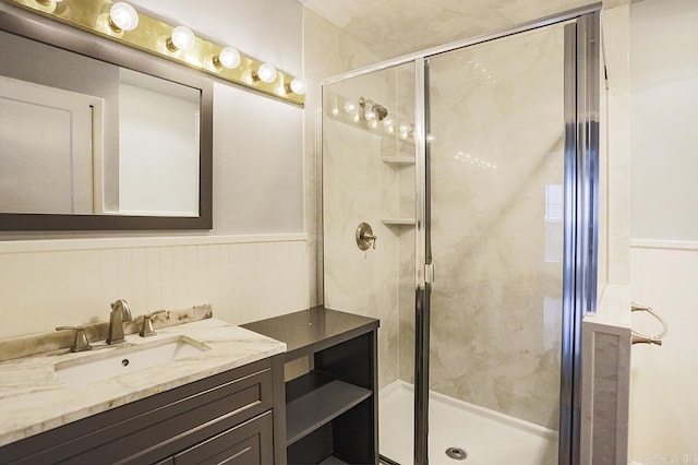 804 N Clarkson Ave, Little Rock, AR 72205 - full bath featuring a shower stall, vanity, and wainscoting