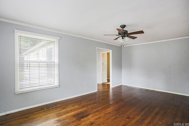 804 N Clarkson Ave, Little Rock, AR 72205 - unfurnished room featuring ornamental molding, a ceiling fan, wood finished floors, and baseboards