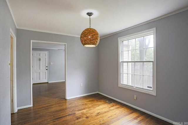 804 N Clarkson Ave, Little Rock, AR 72205 - unfurnished room with wood finished floors, baseboards, and ornamental molding