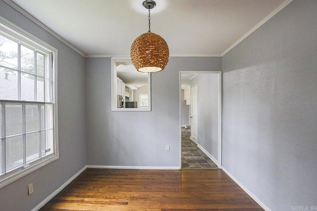 804 N Clarkson Ave, Little Rock, AR 72205 - unfurnished dining area with baseboards, wood finished floors, and ornamental molding