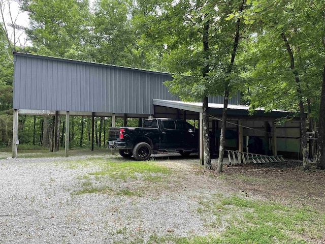 1349 Kahoka Rd, Mountain View, AR 72560 - view of vehicle parking featuring a carport and driveway