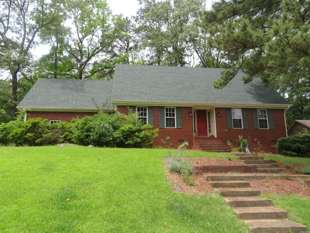 807 N Park Dr, Arkadelphia, AR 71923 - view of front of home featuring brick siding, a front lawn, and a shingled roof