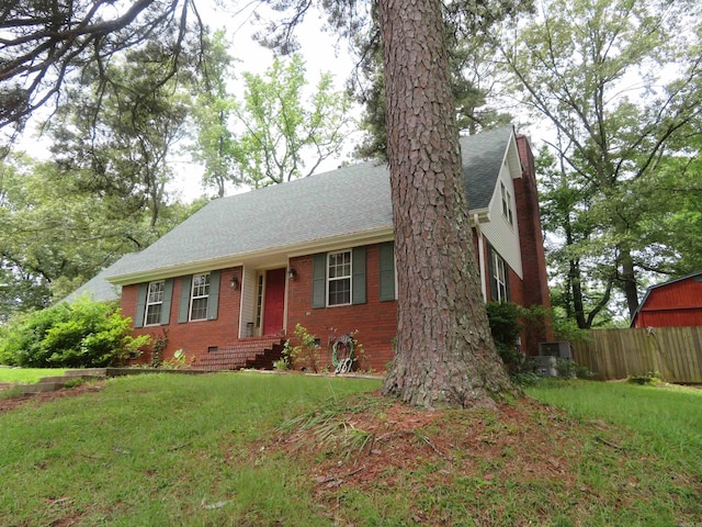 807 N Park Dr, Arkadelphia, AR 71923 - view of front facade featuring brick siding, roof with shingles, and crawl space