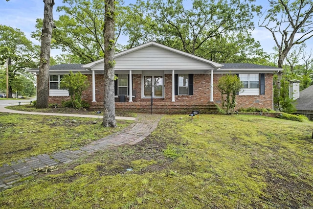 4812 Randolph Rd, North Little Rock, AR 72116 - ranch-style home featuring brick siding and a front lawn