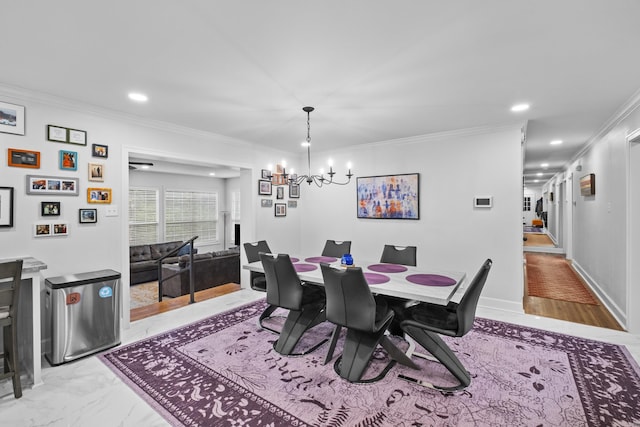 4812 Randolph Rd, North Little Rock, AR 72116 - dining space featuring a chandelier, crown molding, recessed lighting, and light marble finish floors