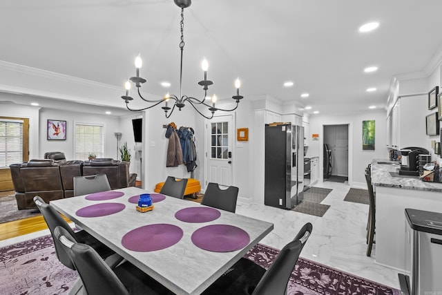 4812 Randolph Rd, North Little Rock, AR 72116 - dining area with recessed lighting, ornamental molding, a chandelier, baseboards, and light marble finish flooring