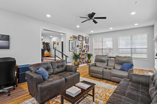 4812 Randolph Rd, North Little Rock, AR 72116 - living area with ceiling fan, recessed lighting, light wood-style floors, healthy amount of natural light, and stairs