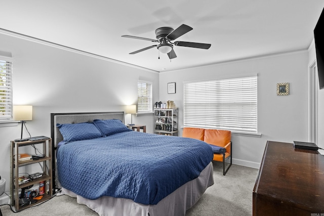 4812 Randolph Rd, North Little Rock, AR 72116 - carpeted bedroom with multiple windows, ornamental molding, ceiling fan, and baseboards