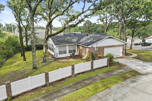 4812 Randolph Rd, North Little Rock, AR 72116 - view of front of house featuring driveway, a garage, brick siding, and a shingled roof