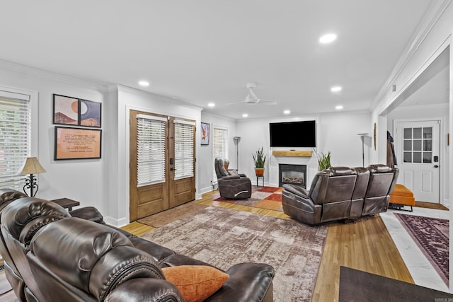 4812 Randolph Rd, North Little Rock, AR 72116 - living area with wood finished floors, a ceiling fan, recessed lighting, crown molding, and a fireplace