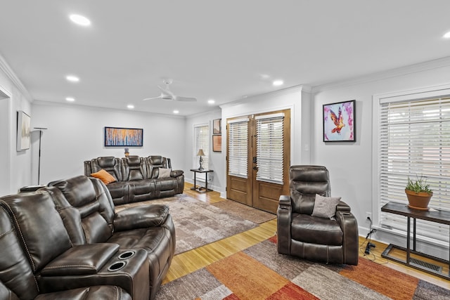 4812 Randolph Rd, North Little Rock, AR 72116 - living area with crown molding, recessed lighting, ceiling fan, wood finished floors, and baseboards