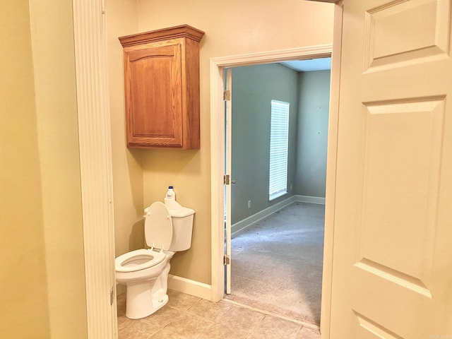 334 Grant 190009, White Hall, AR 71602 - bathroom with toilet, tile patterned floors, and baseboards
