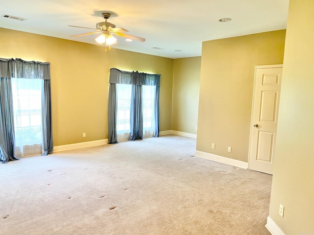 334 Grant 190009, White Hall, AR 71602 - unfurnished room with plenty of natural light, ceiling fan, light carpet, and baseboards