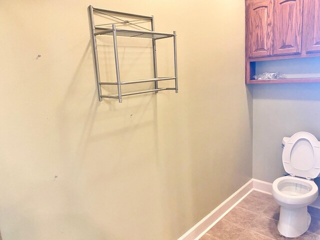 334 Grant 190009, White Hall, AR 71602 - bathroom with toilet, baseboards, and tile patterned flooring