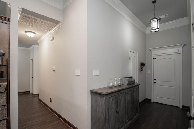766 Mango Loop, Austin, AR 72007 - entrance foyer featuring ornamental molding, dark wood-style flooring, and baseboards