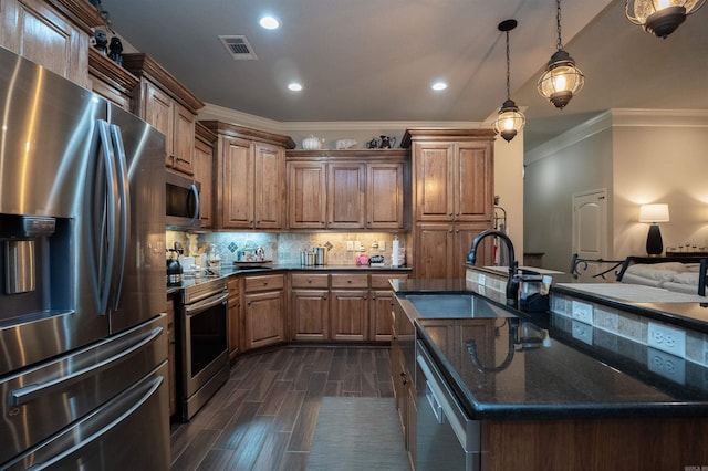 766 Mango Loop, Austin, AR 72007 - kitchen with appliances with stainless steel finishes, crown molding, a sink, backsplash, and recessed lighting