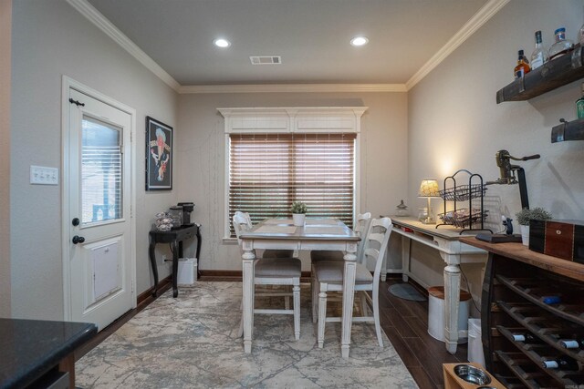 766 Mango Loop, Austin, AR 72007 - dining area with ornamental molding, baseboards, wood finished floors, and recessed lighting