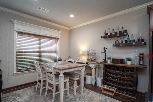 766 Mango Loop, Austin, AR 72007 - dining area with a dry bar, baseboards, crown molding, and recessed lighting