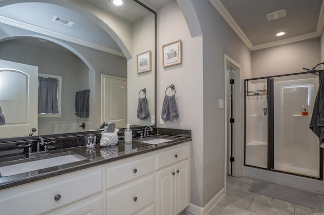 766 Mango Loop, Austin, AR 72007 - full bath featuring ornamental molding, double vanity, a stall shower, and baseboards