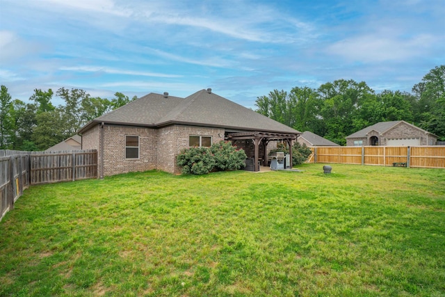 766 Mango Loop, Austin, AR 72007 - back of house featuring a pergola, brick siding, and roof with shingles