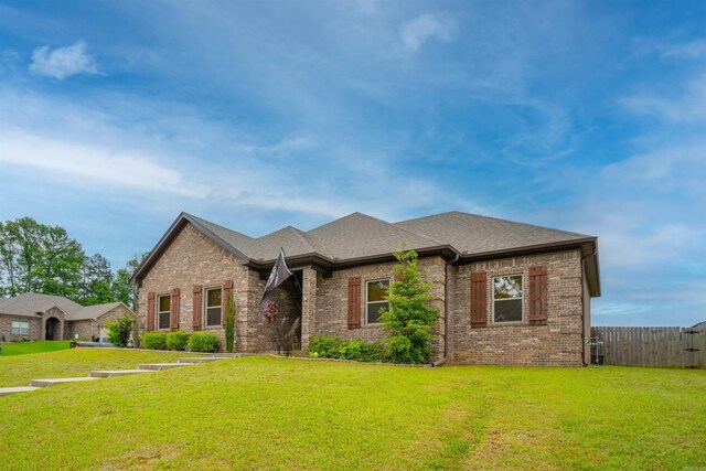 766 Mango Loop, Austin, AR 72007 - view of front of house featuring brick siding and a shingled roof