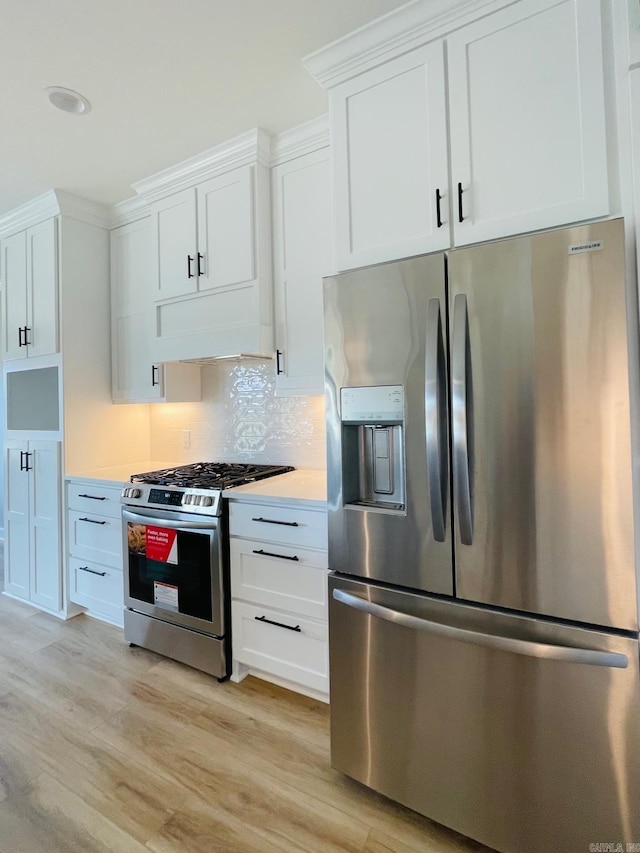 2033 Kaysen Ln, Hensley, AR 72065 - kitchen featuring stainless steel appliances, custom exhaust hood, white cabinets, light countertops, and light wood-type flooring