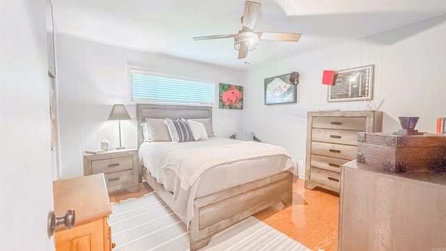 38 Wolfe, Mcgehee, AR 71654 - bedroom with light wood-style floors and ceiling fan