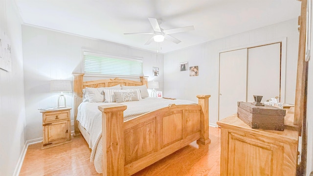 38 Wolfe, Mcgehee, AR 71654 - bedroom with light wood finished floors, a closet, a ceiling fan, and baseboards