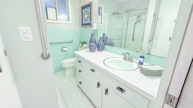 38 Wolfe, Mcgehee, AR 71654 - full bathroom featuring tile patterned flooring, vanity, a stall shower, toilet, and tile walls