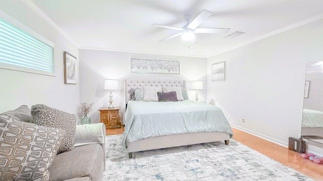 38 Wolfe, Mcgehee, AR 71654 - bedroom with crown molding, baseboards, wood finished floors, and a ceiling fan