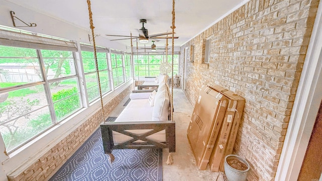 38 Wolfe, Mcgehee, AR 71654 - sunroom featuring brick wall