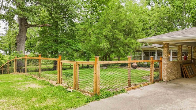 38 Wolfe, Mcgehee, AR 71654 - view of yard with a sunroom
