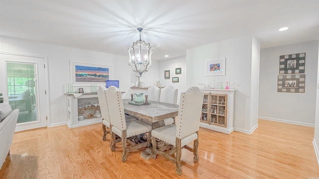 38 Wolfe, Mcgehee, AR 71654 - dining area featuring a chandelier, light wood finished floors, baseboards, and recessed lighting