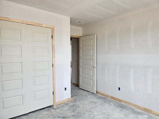 180 Kelton St, Hensley, AR 72065 - unfurnished bedroom featuring carpet, baseboards, and a closet