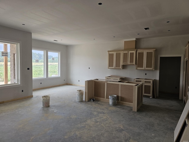 180 Kelton St, Hensley, AR 72065 - kitchen with baseboards and a center island