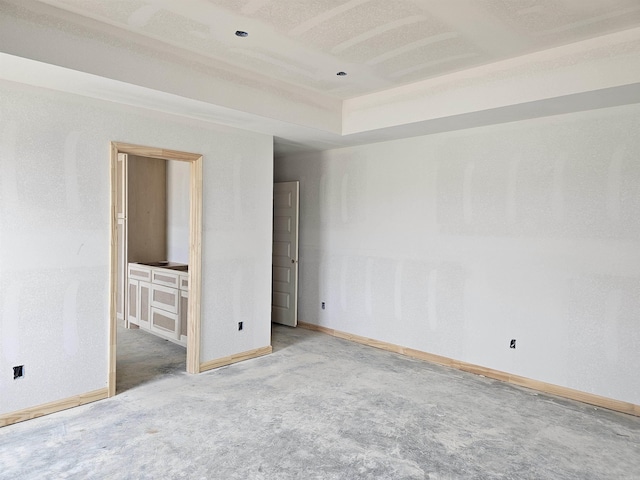 180 Kelton St, Hensley, AR 72065 - unfurnished bedroom featuring baseboards, carpet flooring, and connected bathroom